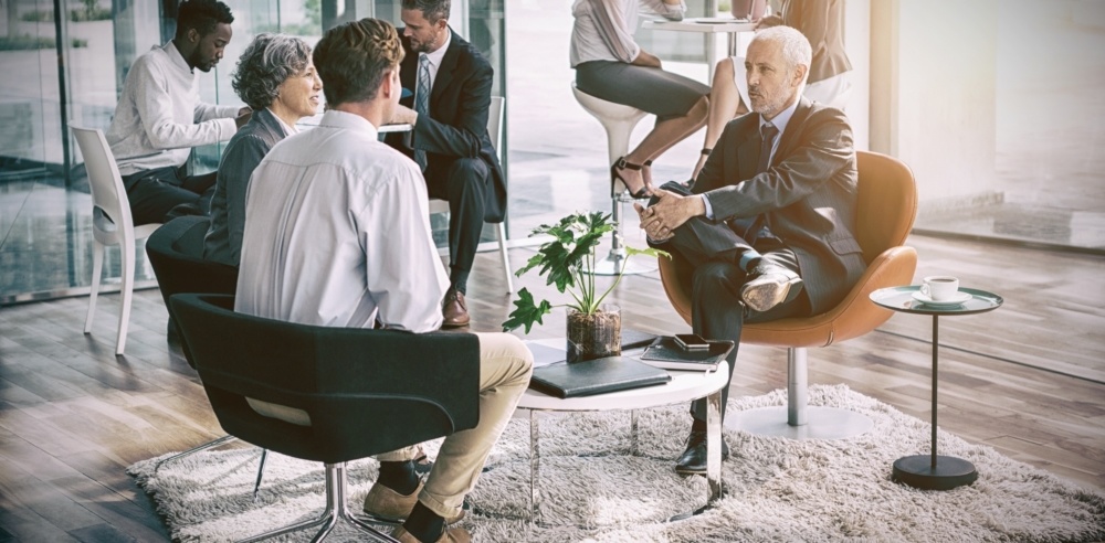 Business executive interacting with each other