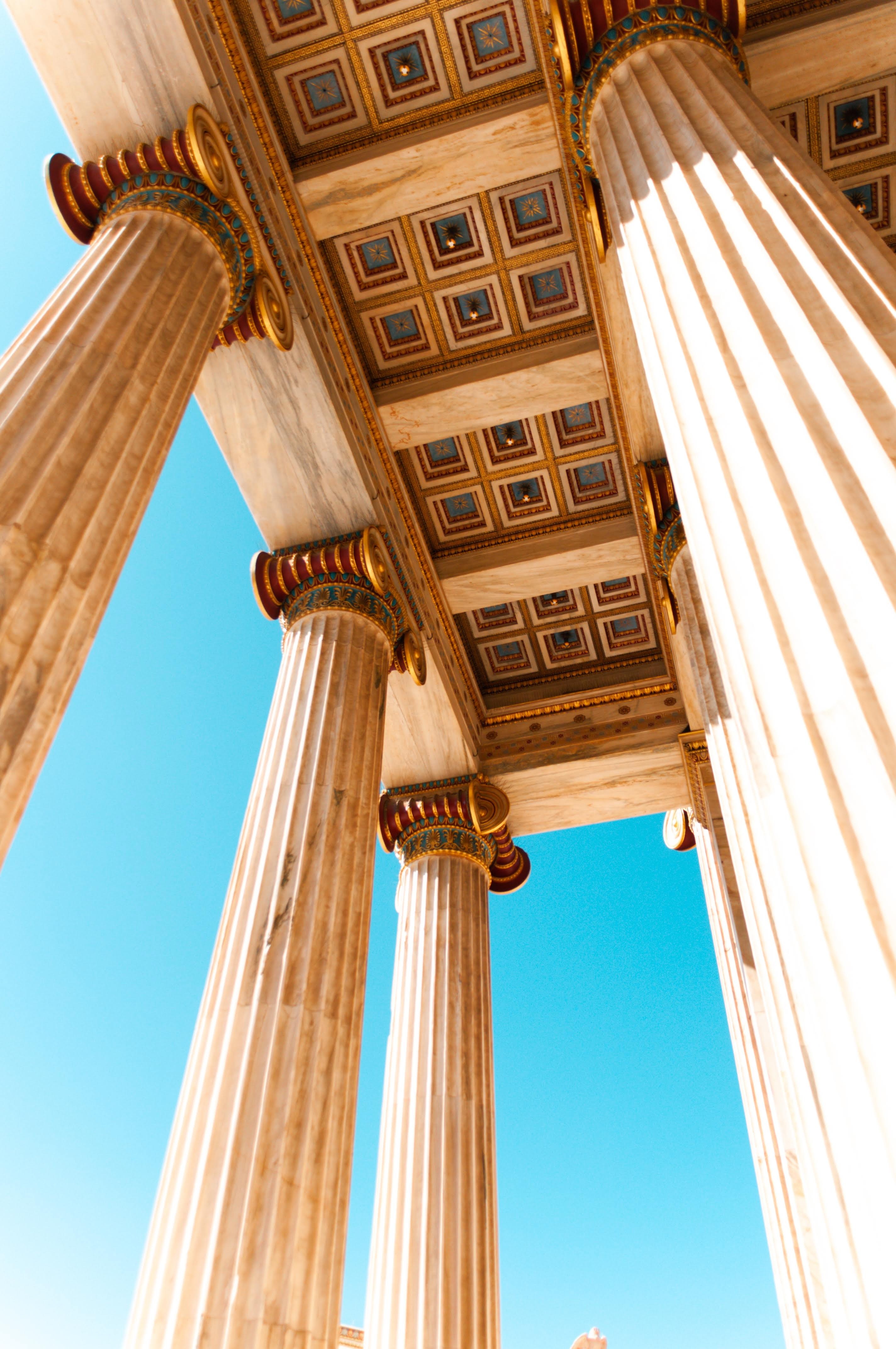 low-angle-photo-of-columns-and-pillars-3224232