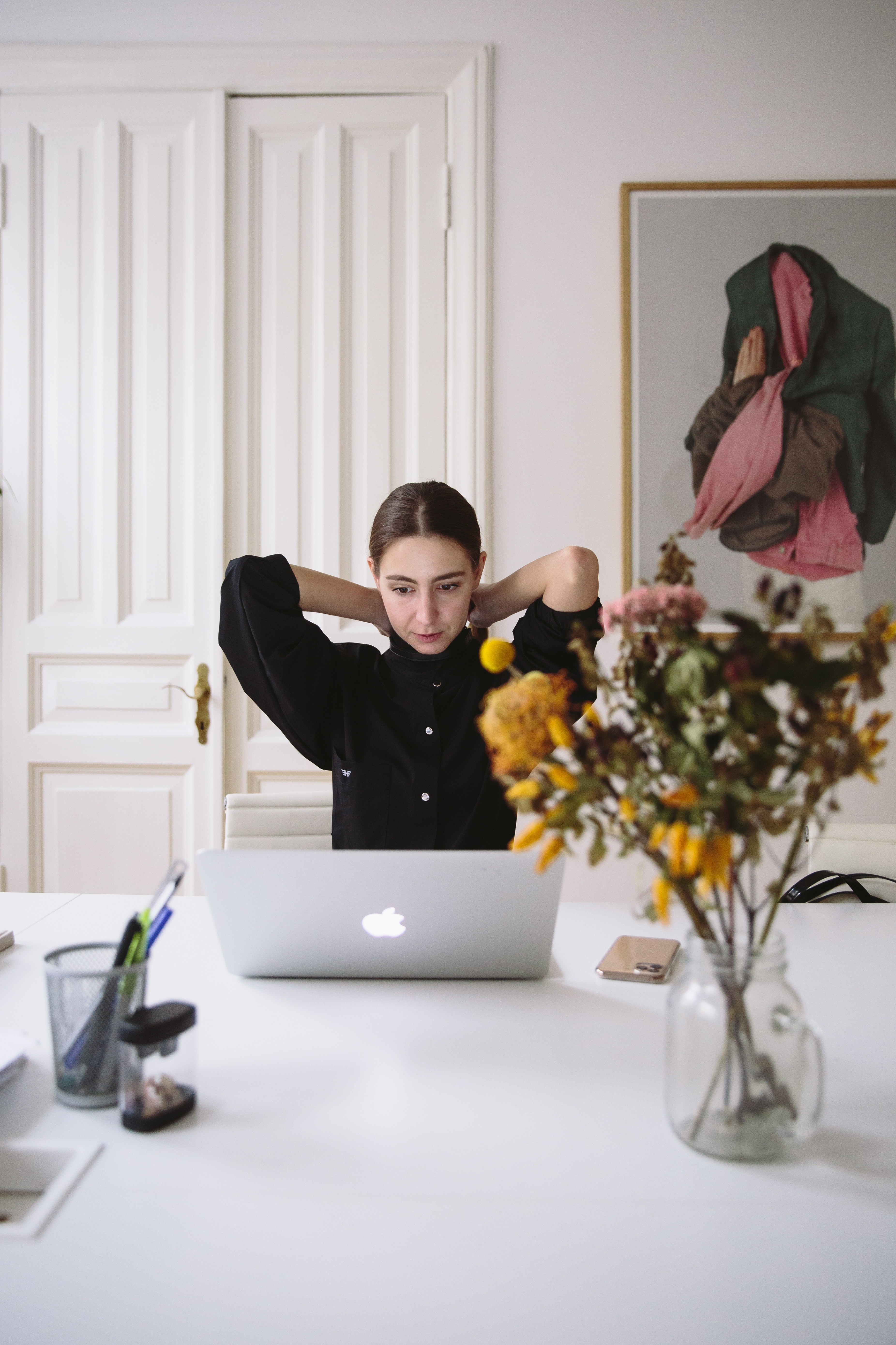 woman-in-black-blouse-sitting-in-front-of-silver-laptop-3747432