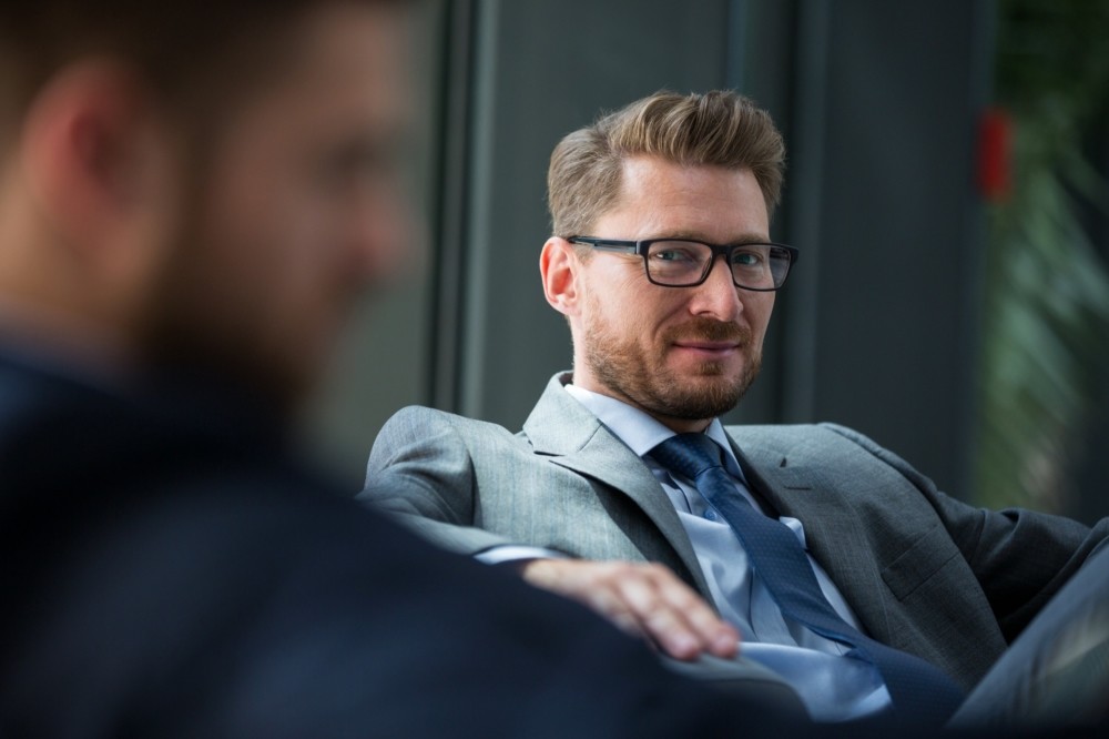 Handsome businessman sitting in office